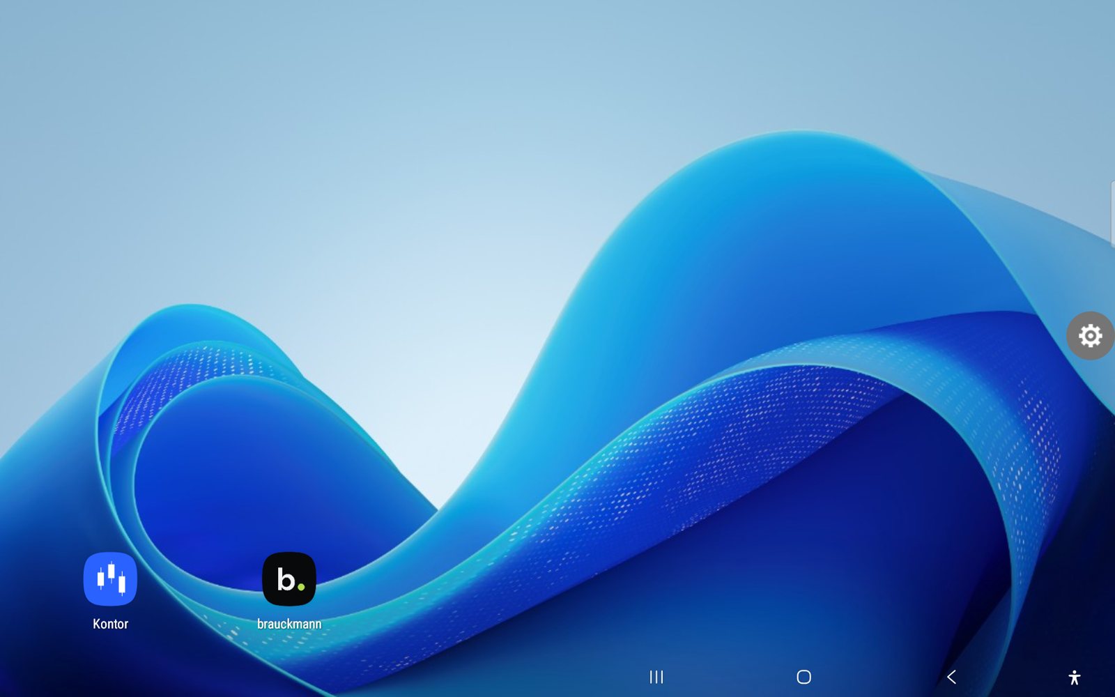Bildschirmfoto des Tablets: Auf dem blauen Hintergrund liegen nur zwei App-Symbole, Kontor und brauckmann